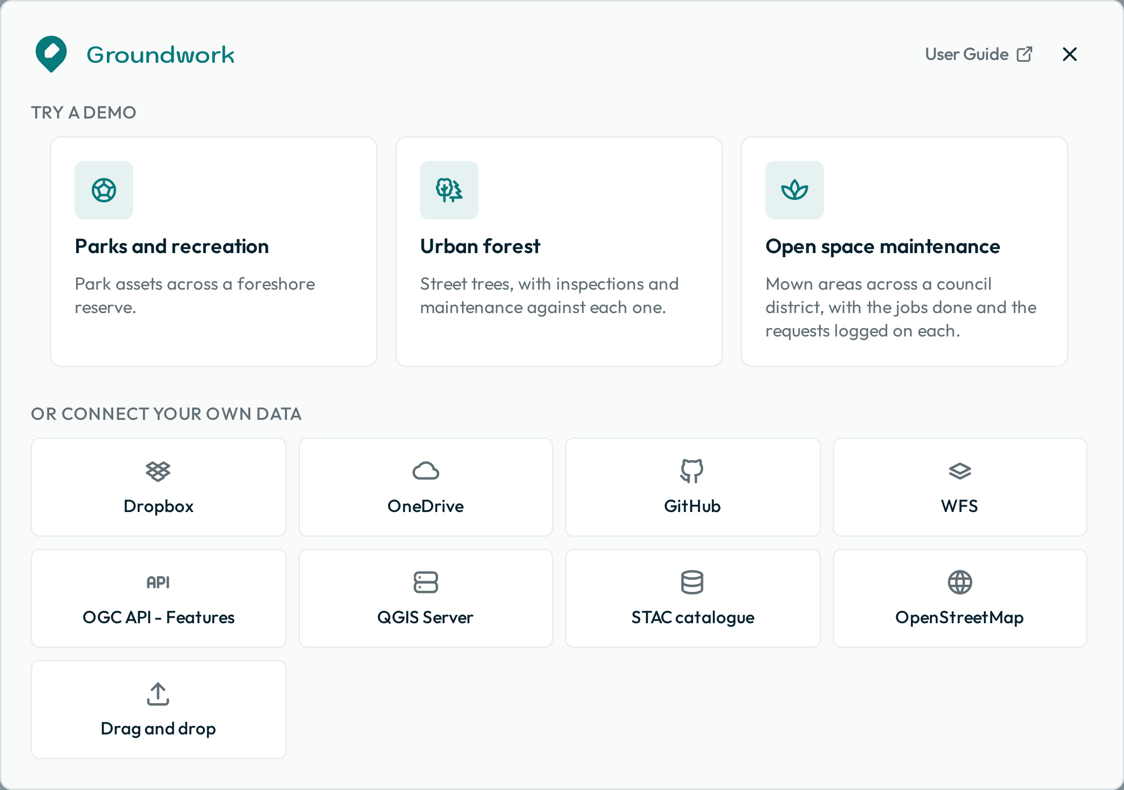 The workspace page, showing a card for each demo map over a grid of tiles for the eight data sources.